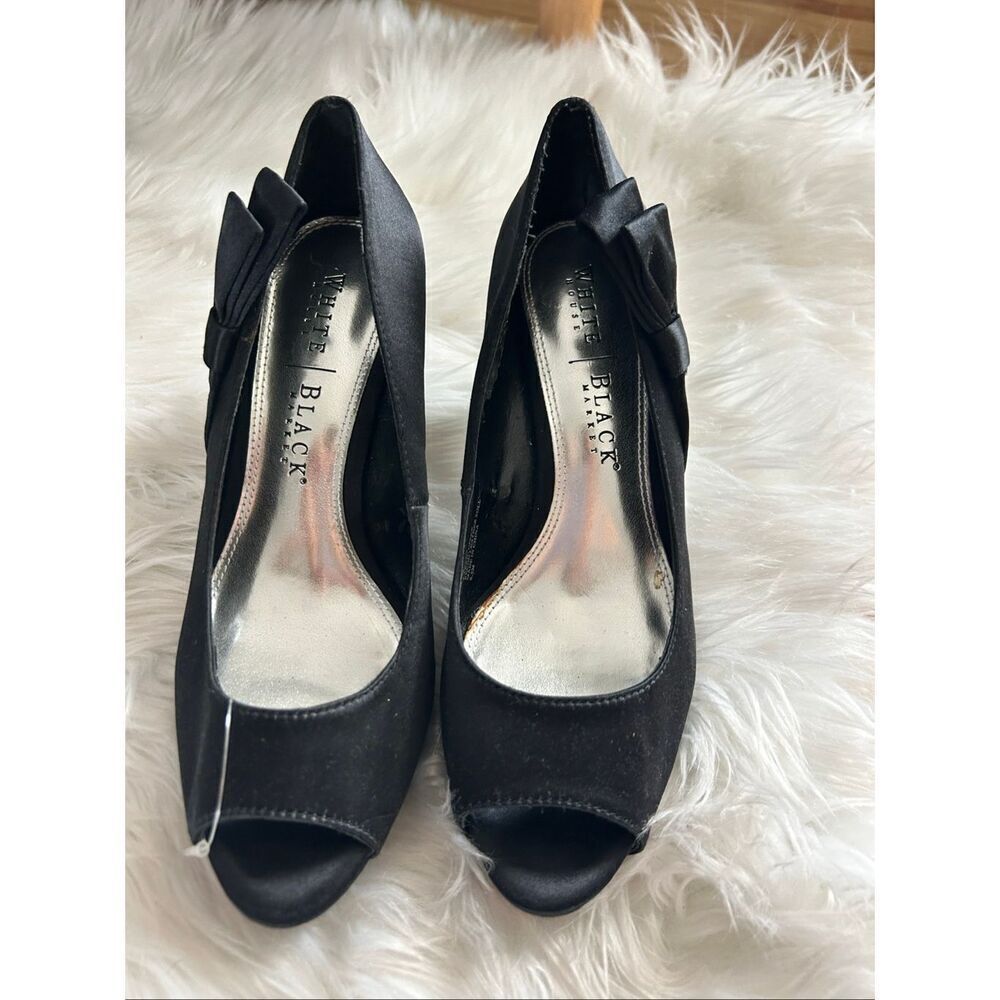 White House black market heels black with bow size 6.5 new but a bit of dry rot